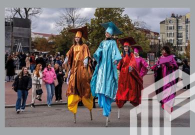 Students of Kyiv-Mohyla Academy walking on stilts celebrate the 409th birthday of the university in Kyiv, Ukraine, 15 October 2024. To illustrate the resilience of universities in Ukraine.