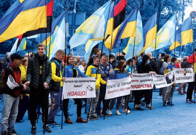 Students and teachers of Ivan Poddubny Olympic College protest about merge of the academic institution and the National University of Physical Education and Sport outside the Cabinet of Ministers building, Kyiv, 2020