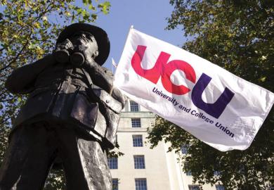 University and College Union (UCU) flag hanging on statue