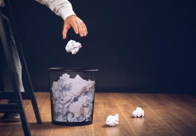 A wastepaper basket illustrating an opinion article about discrimination against non-native English speakers in journal publication