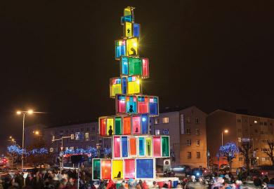 Christmas tree constructed of 121 old windows that come from local old houses is illuminated in Rakvere, Eastern Estonia to illustrate Is the university really a community?