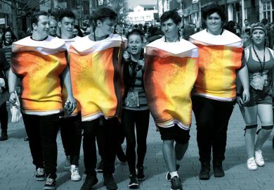 Chichester University's charity pub crawl group dressed in larger outfits for a metaphor for As freshers make up for forgone alcohol experiments during lockdown