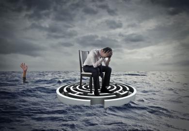 Concept of a person sitting with head in hands on a maze in the sea with a hand in the distance raised to illustrate UK, US law must fix clash between privacy rights and protecting lives