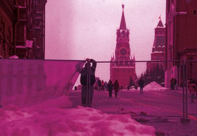 Workers set up a fence at the Red Square to illustrate West should not abandon all Russian scholars