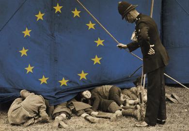 A policeman talking to a group of boys who are sneaking a look a show with the EU flag on the curtain.