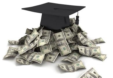 Mortar board with cash to illustrate Pressure to pass mediocre students made me leave academe