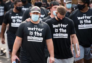  teammates and other student athletes on campus during a demonstration against racial inequality
