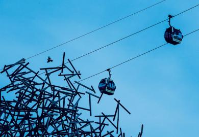 Cable cars run past the 'Quantum Cloud' sculpture to illustrate Academics need to get better at knowing when to move on