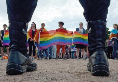 People wave gay rights' movement rainbow flags during the gay pride rally in Saint Petersburg to illustrate Decolonisation is far from progressive under autocracy