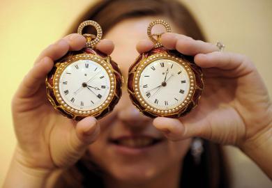 A pair of rare gold pocket watches on display to illustrate A question of timing