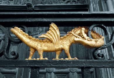 Dragon motif on the ironwork outside King's College Chapel, Cambridge to illustrate Bullying is a feature of UK research universities, not a bug