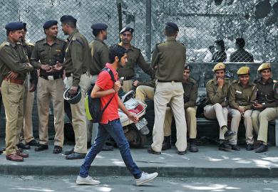 Akhil Bharatiya Vidyarthi Parishad (ABVP) members taking a break at a march from Ramjas College to the Faculty of Arts at Delhi University to illustrate Political interference  on campus is  wasting India’s demographic dividend