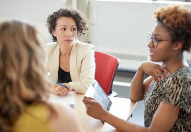 women-meeting-at-table