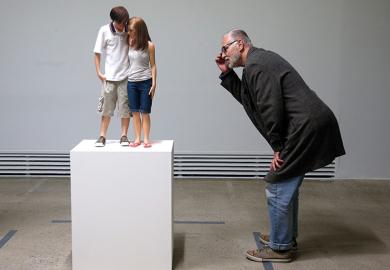 Youth on pedestal