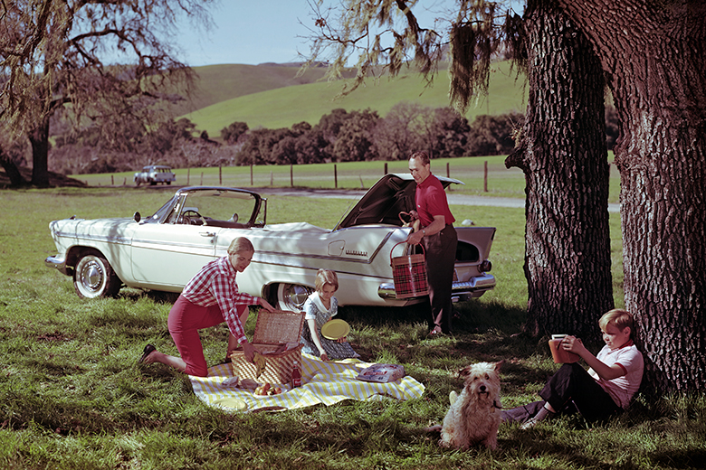 A family of four and their dog enjoy a day outdoors during a picnic, Agoura, CA, 1958 in this advertisement for Plymouth Belvedere convertibles. To illustrate an idealised view of 1950s America which many Trump supporters may wish to return to.