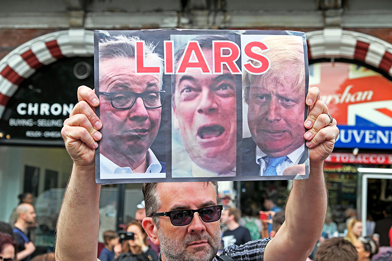 Liars poster featuring Michael Gove, Nigel Farage, Boris Johnson at the March for Europe anti-Brexit protest in London, UK, 2 July 2016.