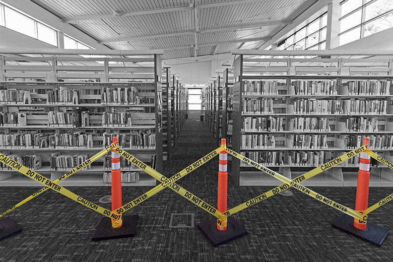 Books cordoned off in a library. To illustrate that academics on teaching-only contracts are unable to continue with their research. Books cordoned off in a library. To illustrate that academics on teaching-only contracts are unable to continue with their research.