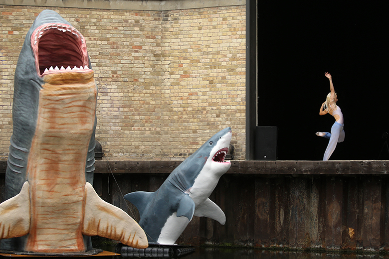 Dancers from The Royal Ballet perform alongside sharks beside the Regent’s Canal in London on 30 August 2020. To illustrate threats to the creative industries in the UK.