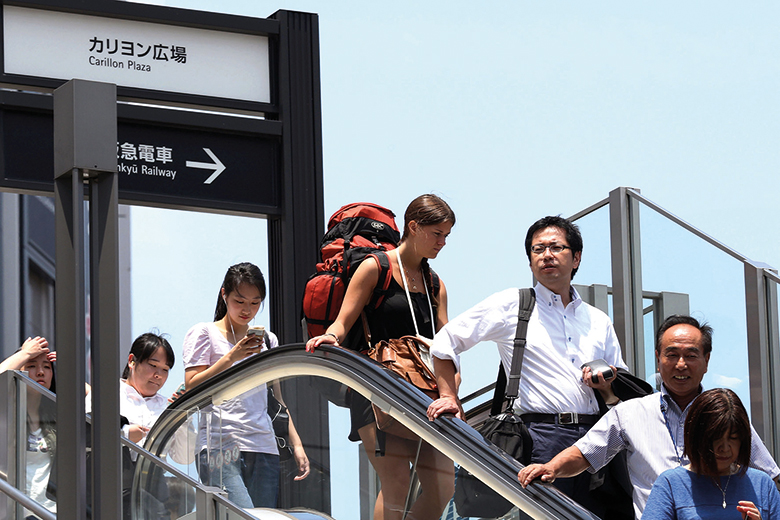 People on escalator