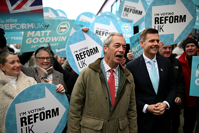 Reform UK candidate Matt Goodwin (R) and Reform UK leader Nigel Farage open the Gorton and Denton Reform UK campaign office, north-west England on 5 February 2026, ahead of the 26 February Gorton and Denton by-election.