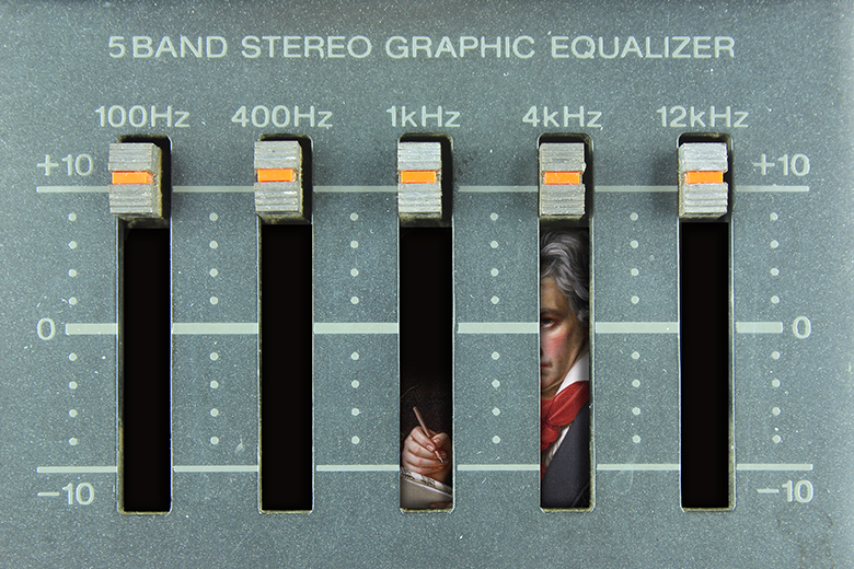 A musical graphic equaliser, with Beethoven writing music hidden behind what looks like bars. To illustrate that growth in courses on music production does not necessarily amount to growth in the scholarly study of music.