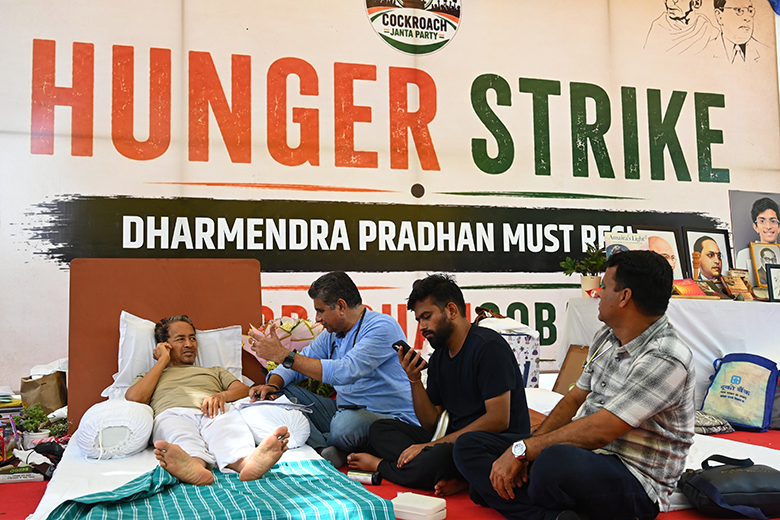 Activist Sonam Wangchuk helped by volunteers for his daily medical checkup, as he continues his indefinite hunger strike for the nineteenth consecutive day in solidarity with the Cockroach Janta Party (CJP). Activist Sonam Wangchuk helped by volunteers for his daily medical checkup, as he continues his indefinite hunger strike for the nineteenth consecutive day in solidarity with the Cockroach Janta Party (CJP).