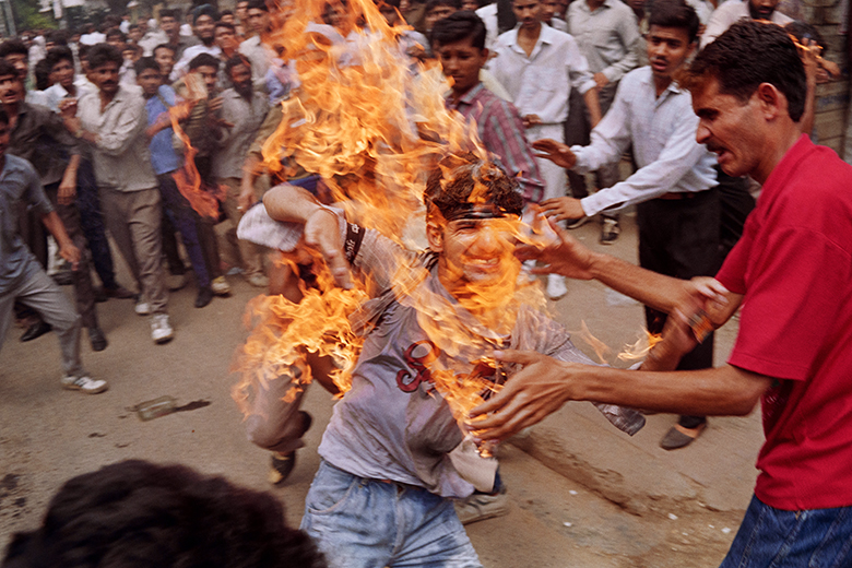 A student sets himself on fire on 19 September 1990 in New Delhi, in a protest over job quotas for the country’s disadvantaged lower castes, as students oppose the allocation of 50 per cent of government jobs to the lower castes.