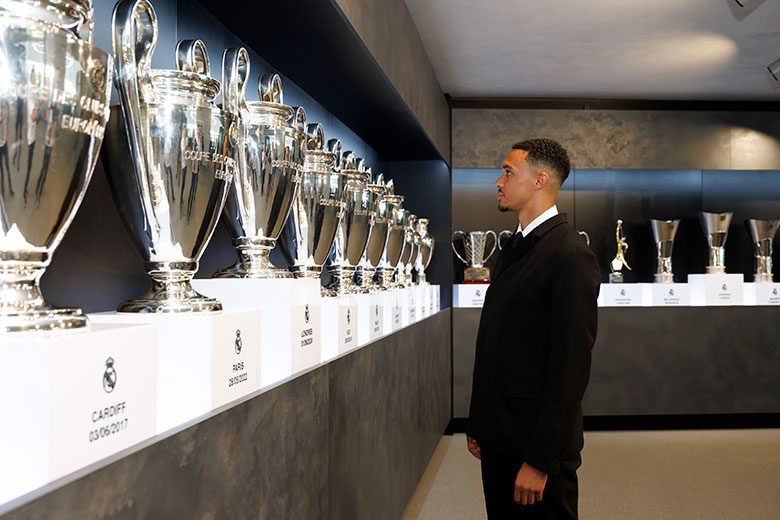Trent Alexander-Arnold looks at the trophy cabinet as he is unveiled as a Real Madrid player at Valdebebas training ground on 12 June 2025 in Madrid, Spain. To illustrate whether ERC funding should be spread more evenly around the continent.