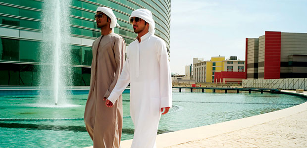 Two men walking in United Arab Emirates