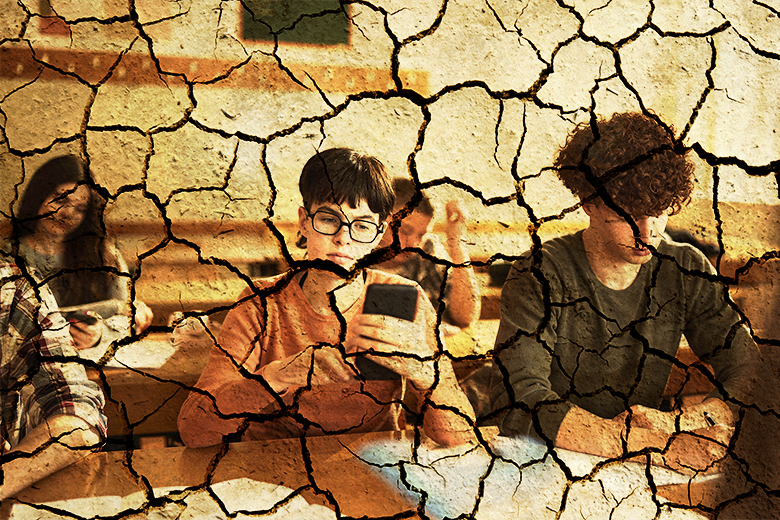 Student on a smartphone in class, with parched earth overlaid. To illustrate that people use AI without realising that there’s an environmental footprint associated with it. Student on a smartphone in class, with parched earth overlaid. To illustrate that people use AI without realising that there’s an environmental footprint associated with it.