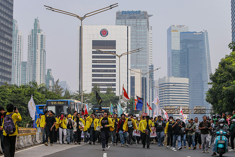 University students participate in a protest against government policies, including measures to address rupiah depreciation, the free meals programme, and rising fuel prices for 92-octane gasoline, in Jakarta, Indonesia, on 12 June 2026.