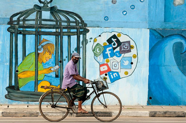 Man on bike in Sri Lanka