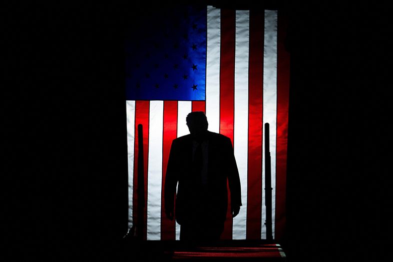 Donald Trump arrives to deliver a speech marking his 100th day in office at Macomb County Community College Sports Expo Center in Warren, Michigan on 29 April 2025