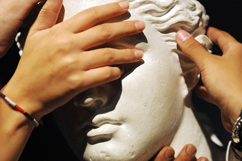 hands on statue