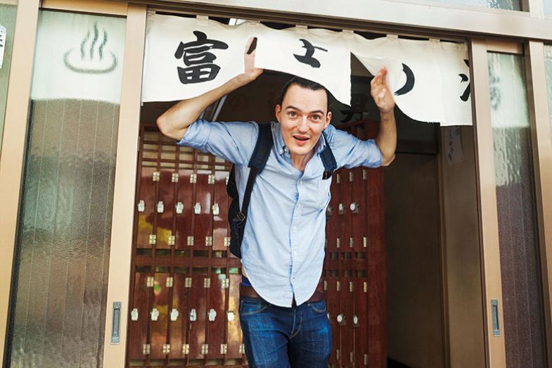 Man coming out of a public bath house