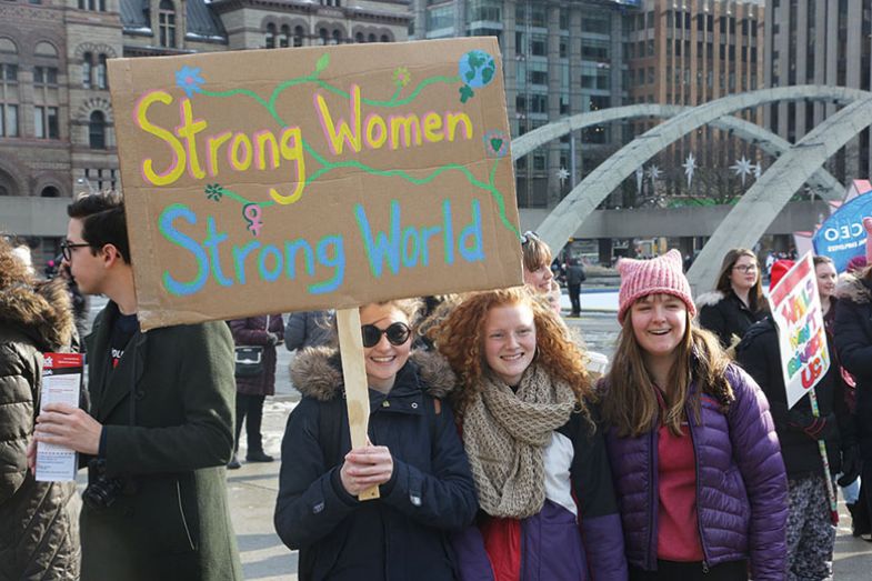 Women with placard Women with placard
