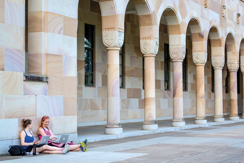 Students using laptops on University of Queensland campus