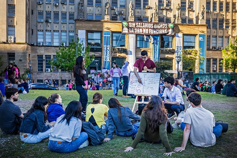 An anatomy class outside the Faculty of Medicine, Buenos Aires, Argentina, for a group of students as a form of protest demanding a salary increase and an increase in the budget allocated to universities, 16 October 2024.