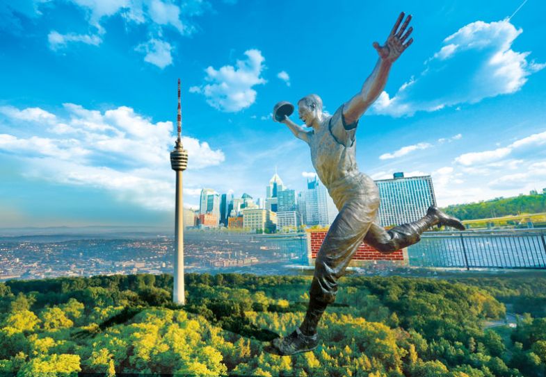 Montage of a statue of a man leaping in the Stuttgart skyline to illustrate Having my pretzel and eating it