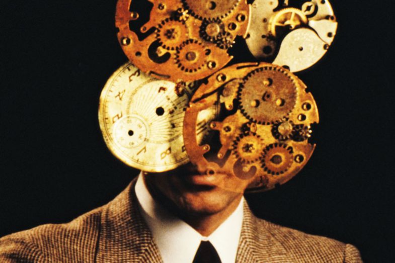 A man with a clockwork mechanism superimposed over his face