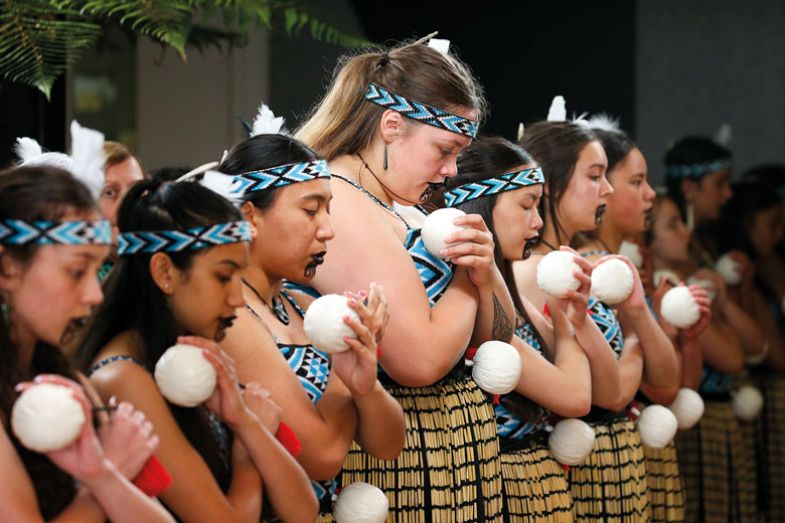 Members of a Maori cultural group perform 