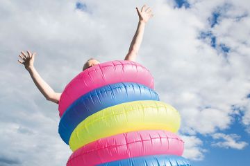 A man wearing several rubber rings A man wearing several rubber rings
