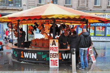 Fairground attraction in Paisley town centre Fairground attraction in Paisley town centre