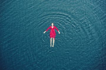 A woman floating in the sea