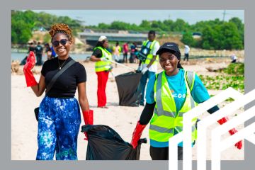 Two women participating in a beach clean-up in Africa, organised by the All-Africa Students Union (AASU). Two women participating in a beach clean-up in Africa, organised by the All-Africa Students Union (AASU).