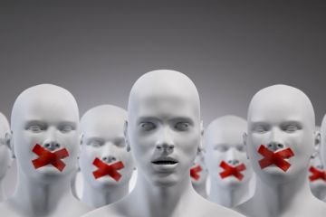 Mannequins, some with tape over their mouths