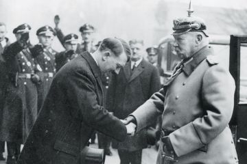 Adolf Hitler greets President Paul von Hindenburg, 1934