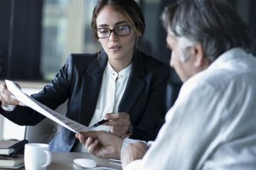 istock giving advice a woman advises a man