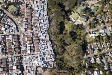 Aerial overhead township and middle class houses in South Africa Aerial overhead township and middle class houses in South Africa