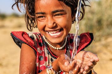 A girl washing her hands A girl washing her hands